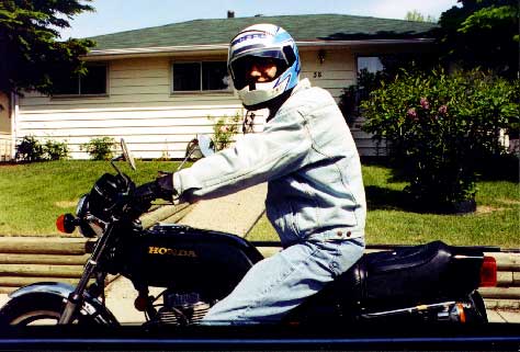 First photo of me on a motorcycle! Seems like ages ago...