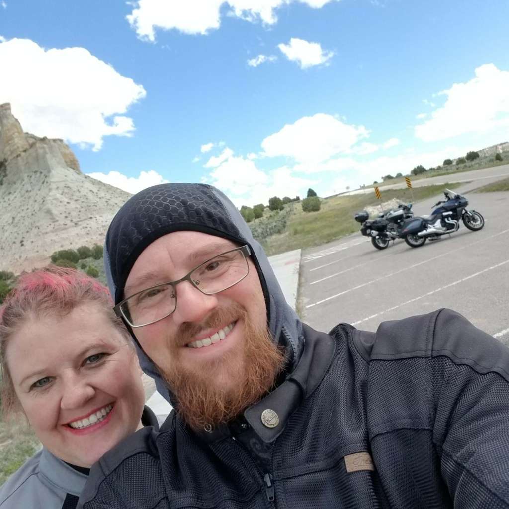 Staff writers Eric and Carrie Leaverton are pictured in a scenic enviornemnt. Eric is wearing a gray and black balaclava.
