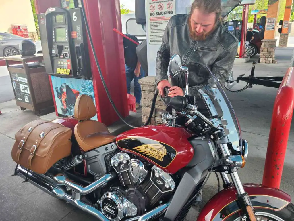 Staff writer Eric Leaverton fueling the 2019 Indian Scout.