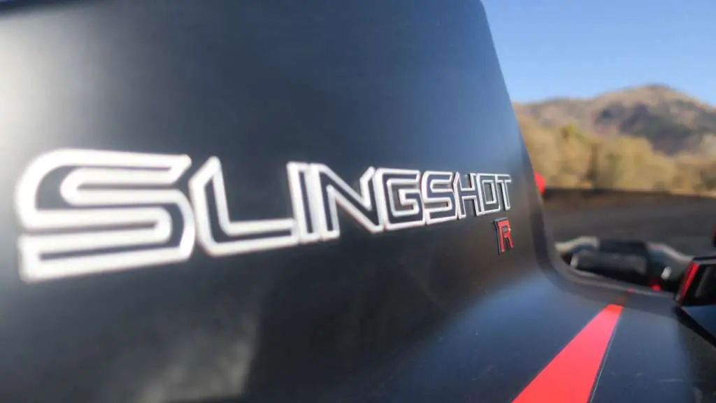 Extreme close-up of the Slingshot logo on the dorsal fin of the Slingshot.